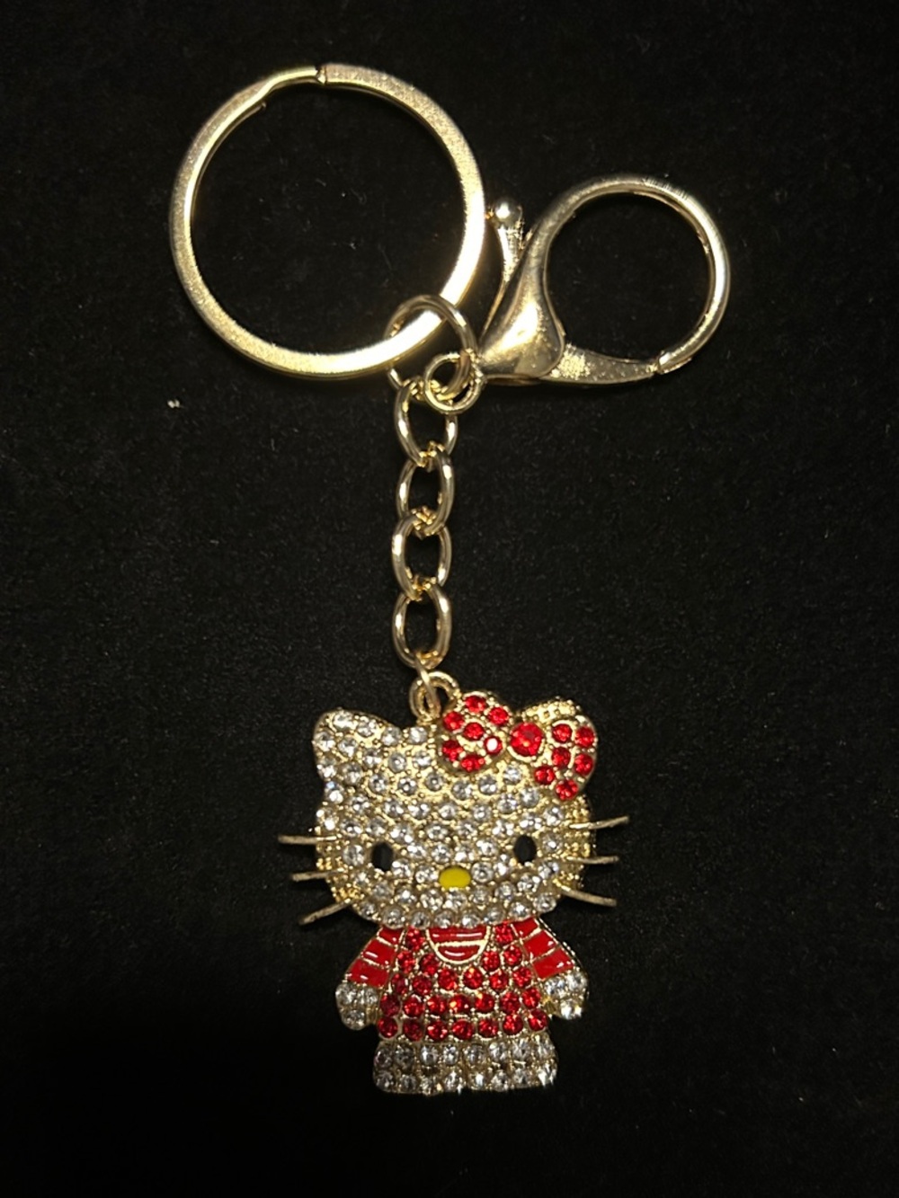 Hello Kitty Gold Tone Keychain/ Bag Charm with Red and Clear Bling